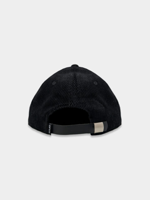 The back of the OFUR cap with the label and the leather strap as detail