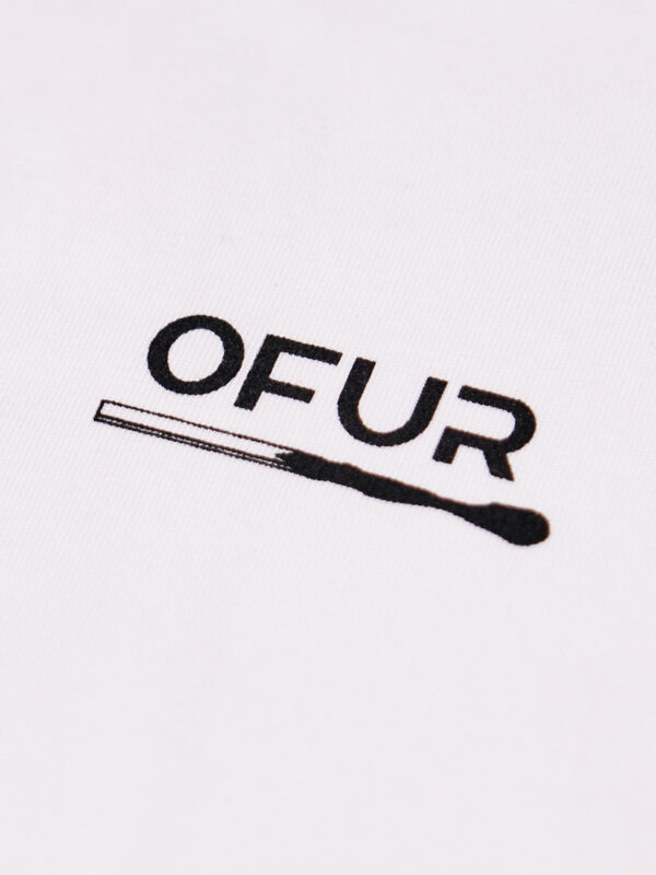 close up of the OFUR logo screen printed on a white T-Shirt