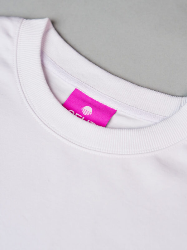 Close up of the OFUR neck label in the white T-Shirt