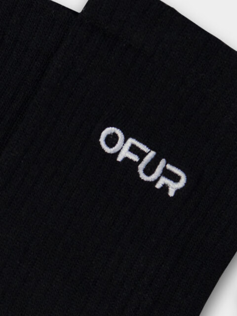 Close up of the OFUR Embroidered socks in black