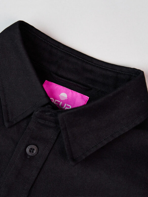 Close up of the OFUR shirt with the OFUR label shown in the picture