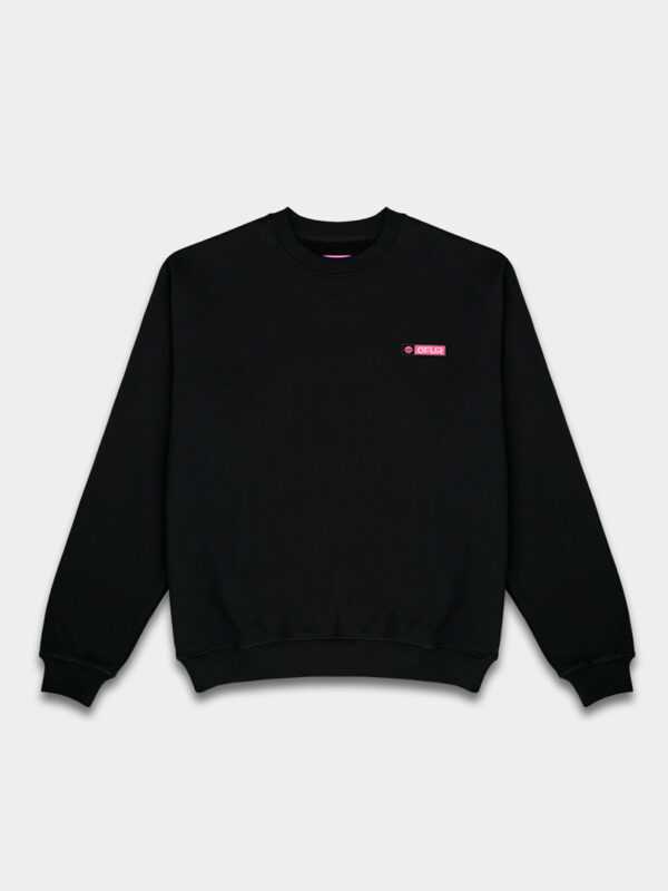 The front of the OFUR rise beyond magenta crewneck with the OFUR logo in magenta on the left side of the chest