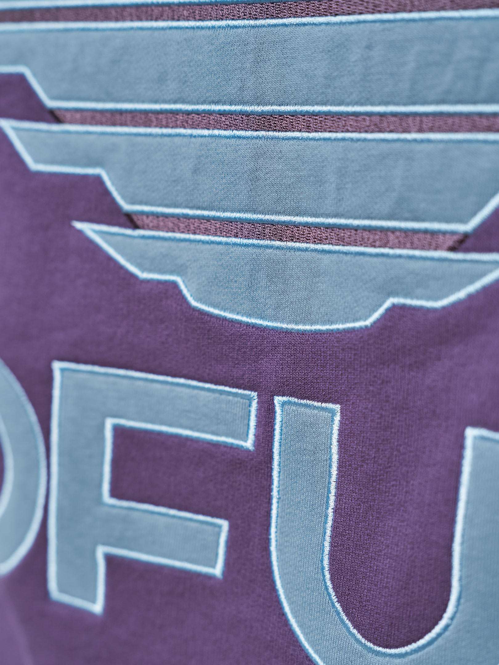 OFUR_FW25_RISE_APPLIQUE_PURPLE_HOODIE_CLOSE_UP_BACK_1