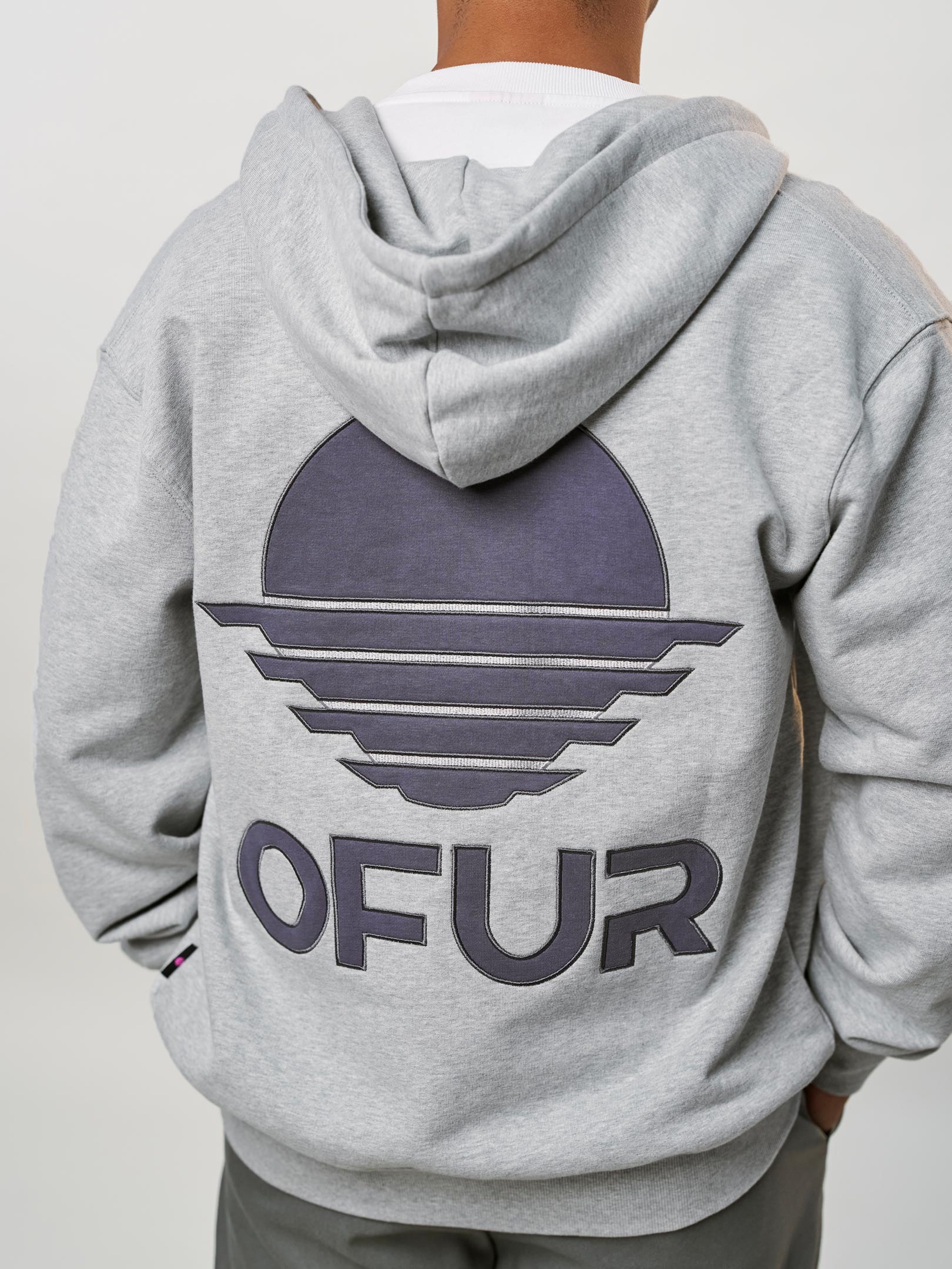 OFUR_FW25_RISE_APPLIQUE_ZIP_HOODIE_CLOSE_UP_BACK_1