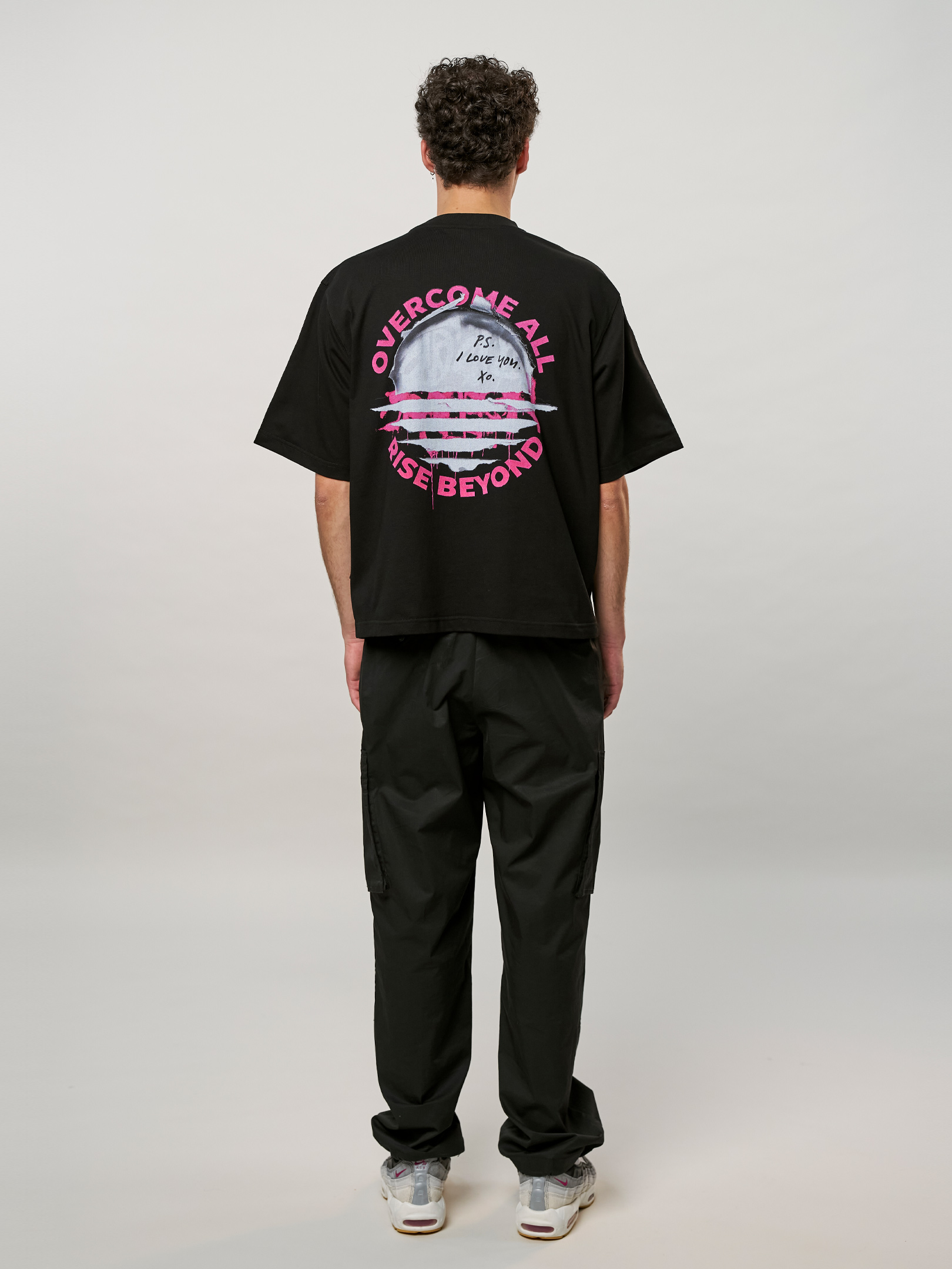 OFUR_FW25_RISE_TORN_PAPER_CROPPED_TSHIRT_FULL_BODY_BACK_1