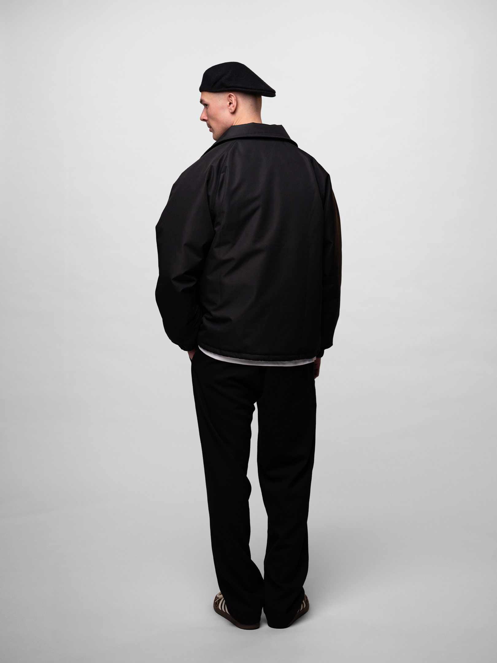 OFUR_SS26_ORIGINAL_COACH_JACKET_BLACK_FULL_BODY_BACK_1