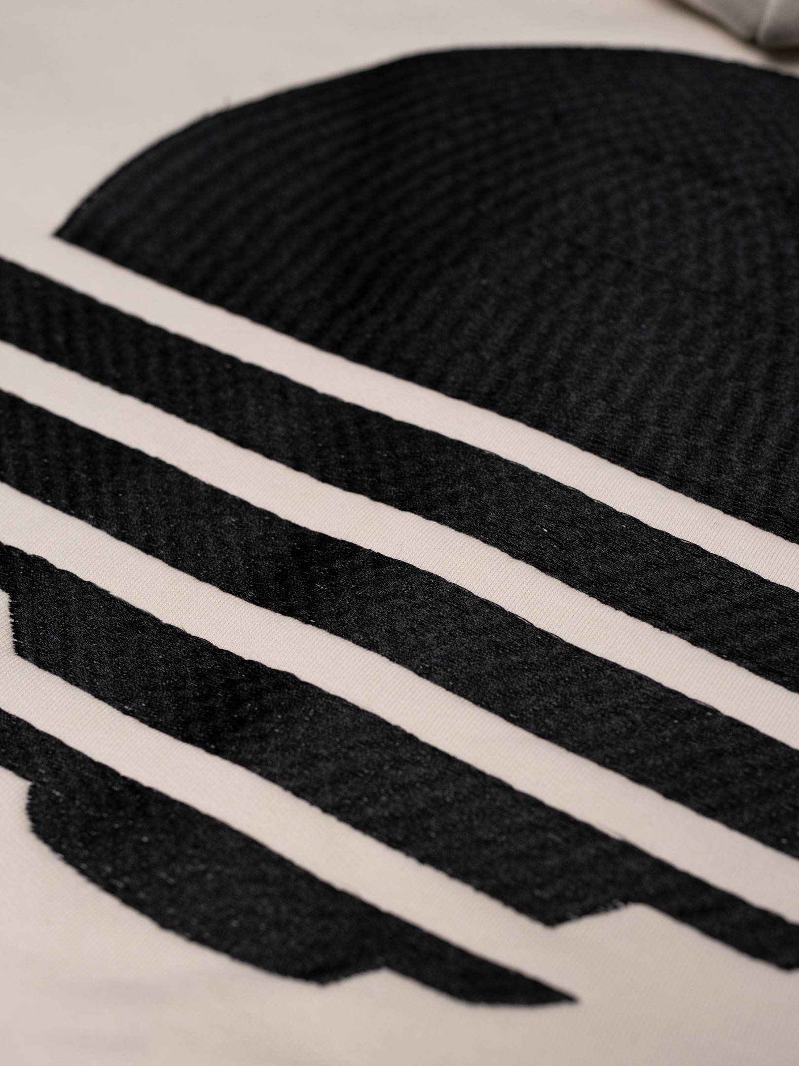 OFUR_SS26_RISE_BLACK_ZIP_HOODIE_LIGHT_CREAM_FLATLAY_DETAIL_1