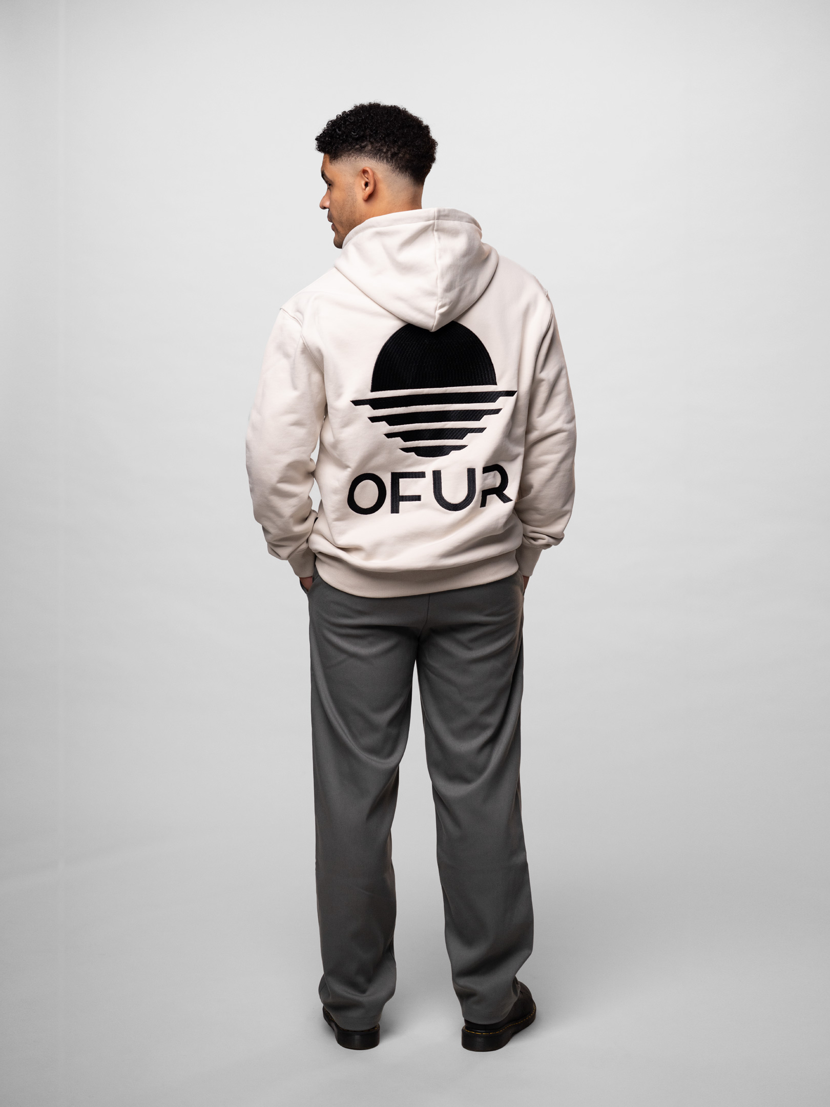 OFUR_SS26_RISE_BLACK_ZIP_HOODIE_LIGHT_CREAM_FULL_BODY_BACK_1