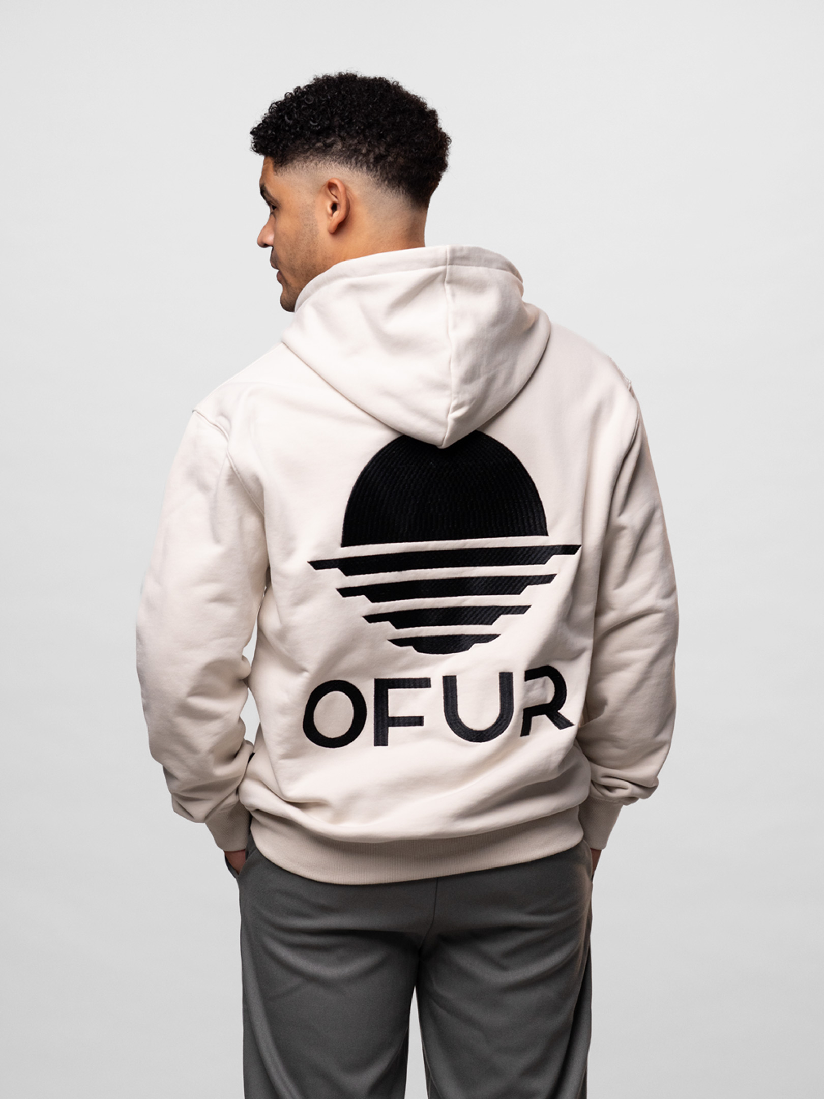 OFUR_SS26_RISE_BLACK_ZIP_HOODIE_LIGHT_CREAM_UPPER_BODY_BACK_1