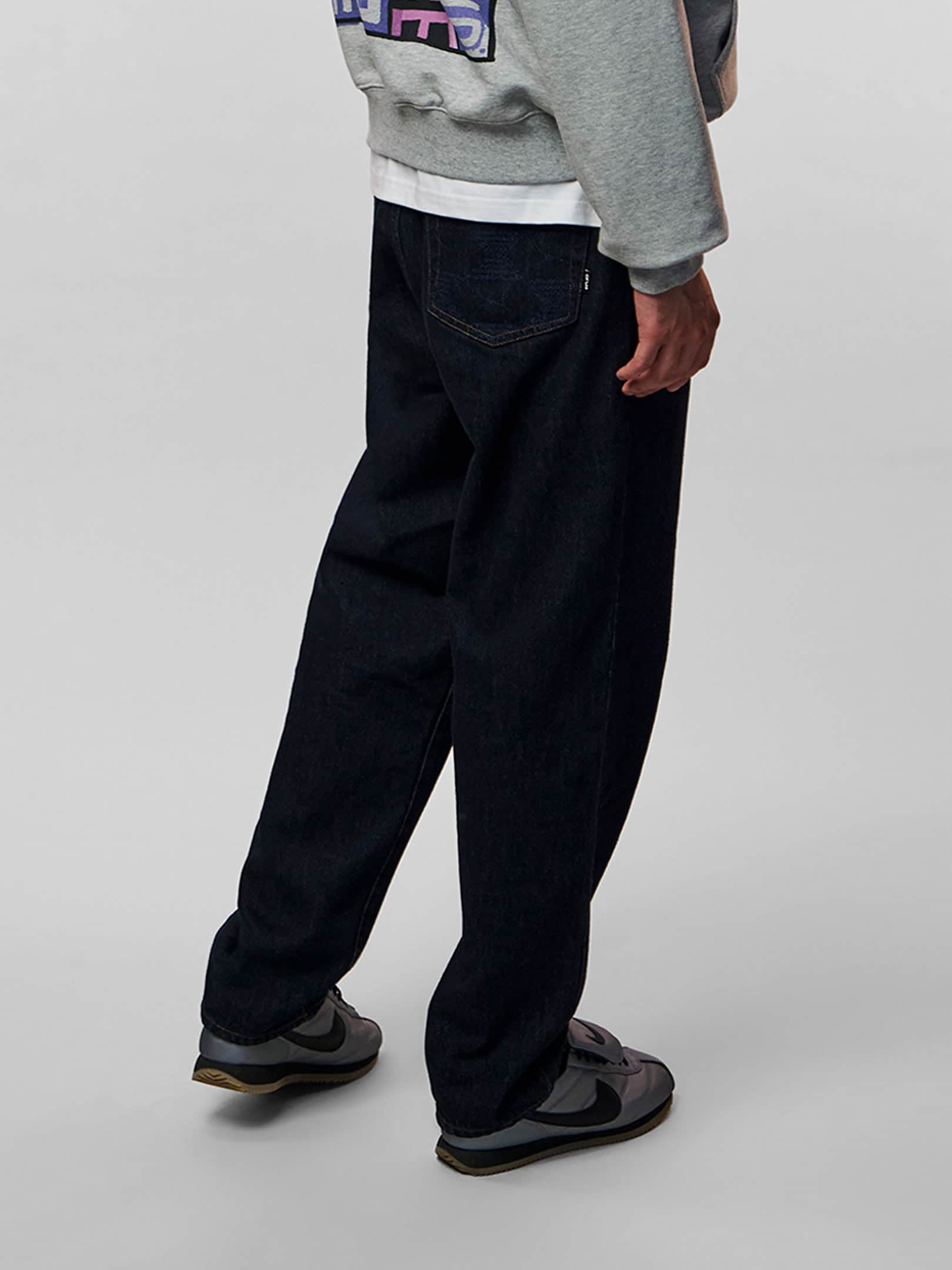OFUR_FW26_ENDLESS_SUNRISE_JEANS_DARK_BLUE_LOWER_BODY_SIDE_2