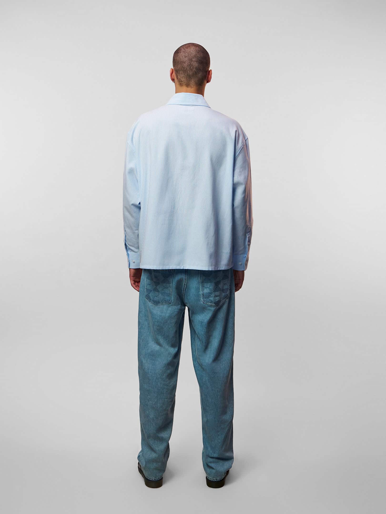 OFUR_FW26_SCATTERED_LETTERS_SHIRT_LONG_SLEEVE_BLUE_FULL_BODY_BACK_1