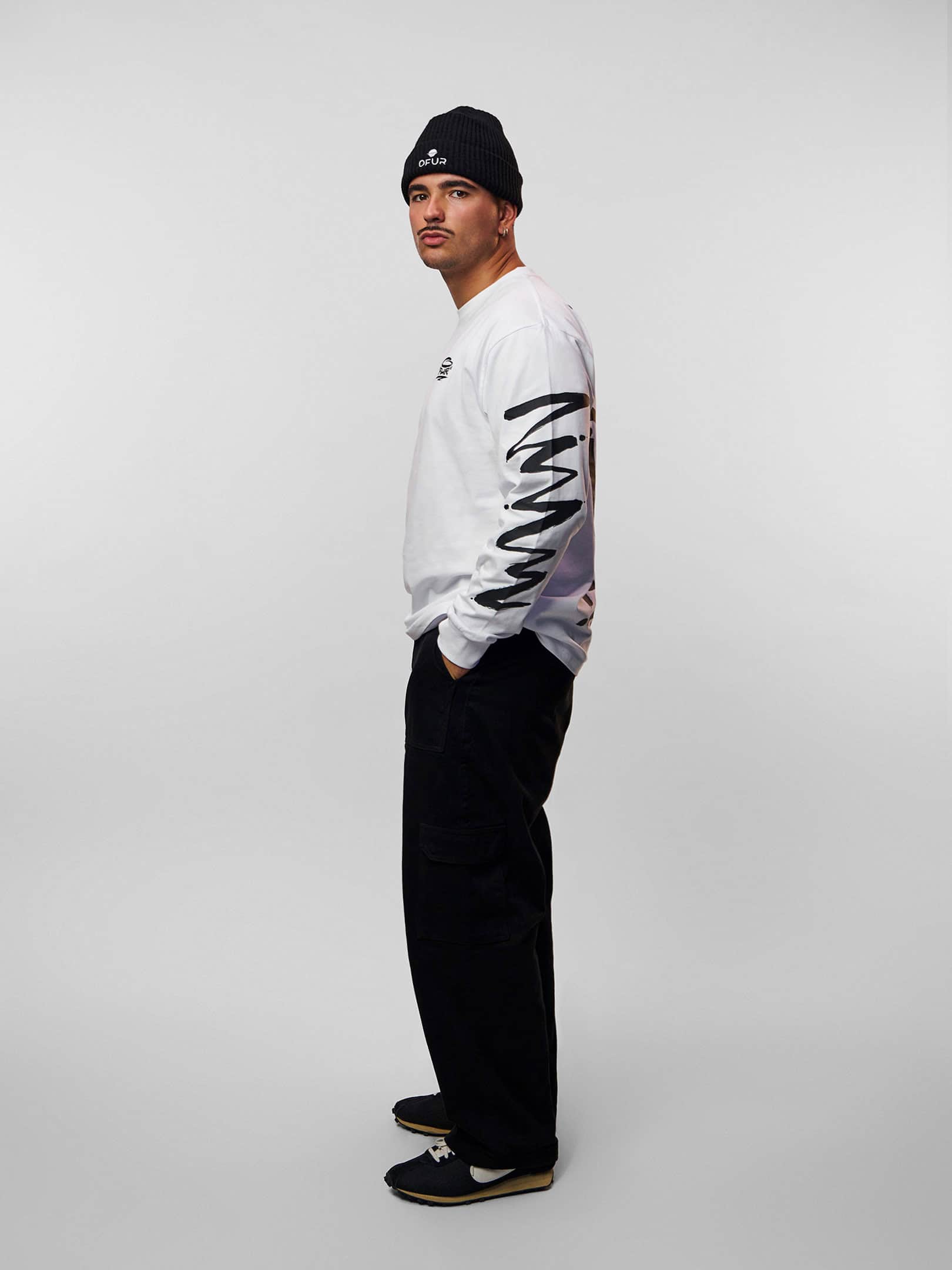 OFUR_FW26_UNSPOKEN_SCRIBBLES_LONGSLEEVE_WHITE_FULL_BODY_SIDE_1