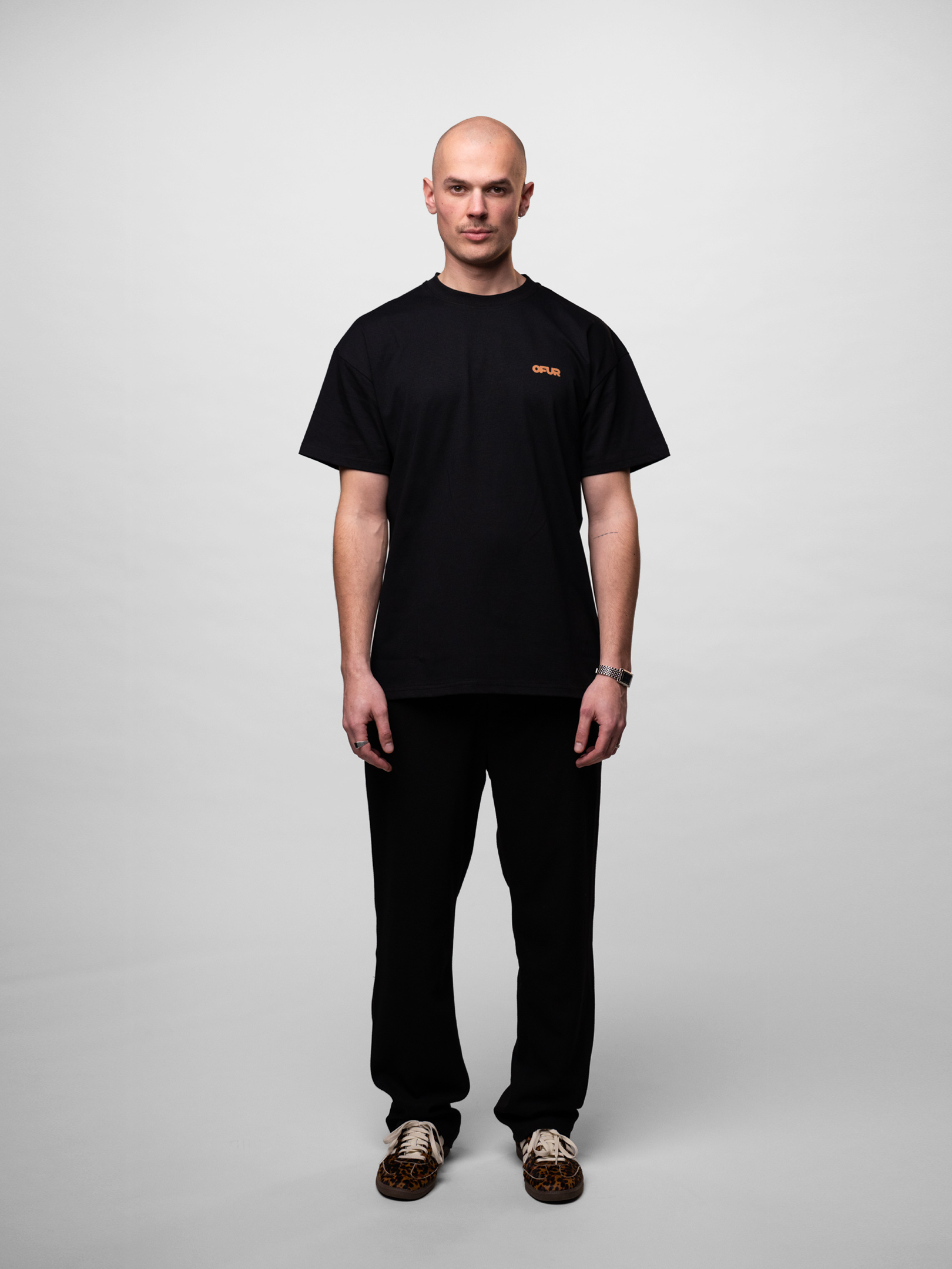 OFUR_SS26_FATNESS_ORANGE_TSHIRT_BLACK_FULL_BODY_FRONT_1