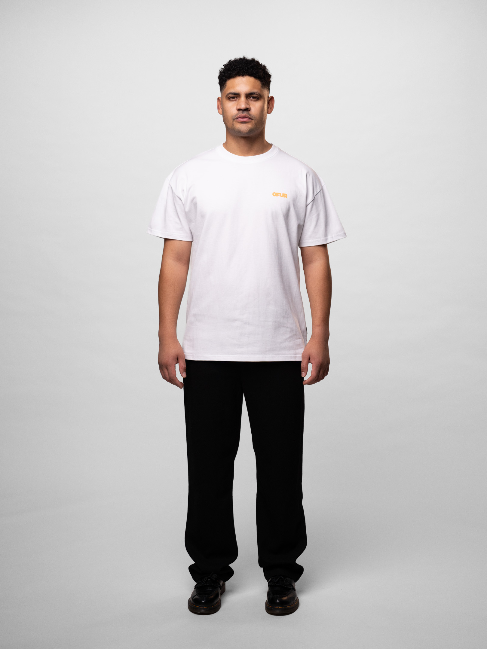 OFUR_SS26_FATNESS_ORANGE_TSHIRT_WHITE_FULL_BODY_FRONT_1