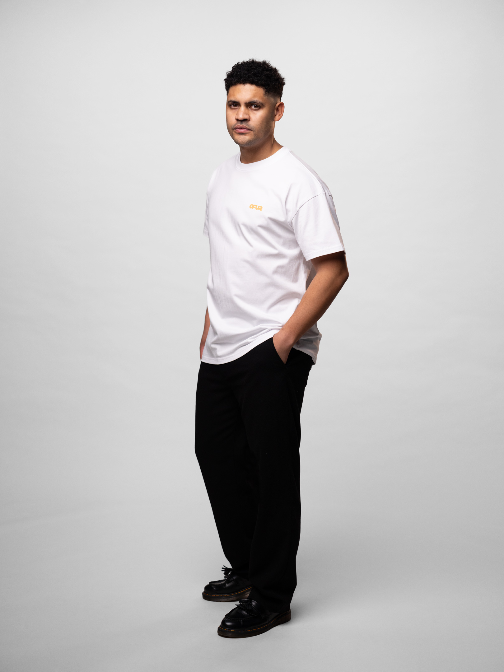 OFUR_SS26_FATNESS_ORANGE_TSHIRT_WHITE_FULL_BODY_SIDE_1