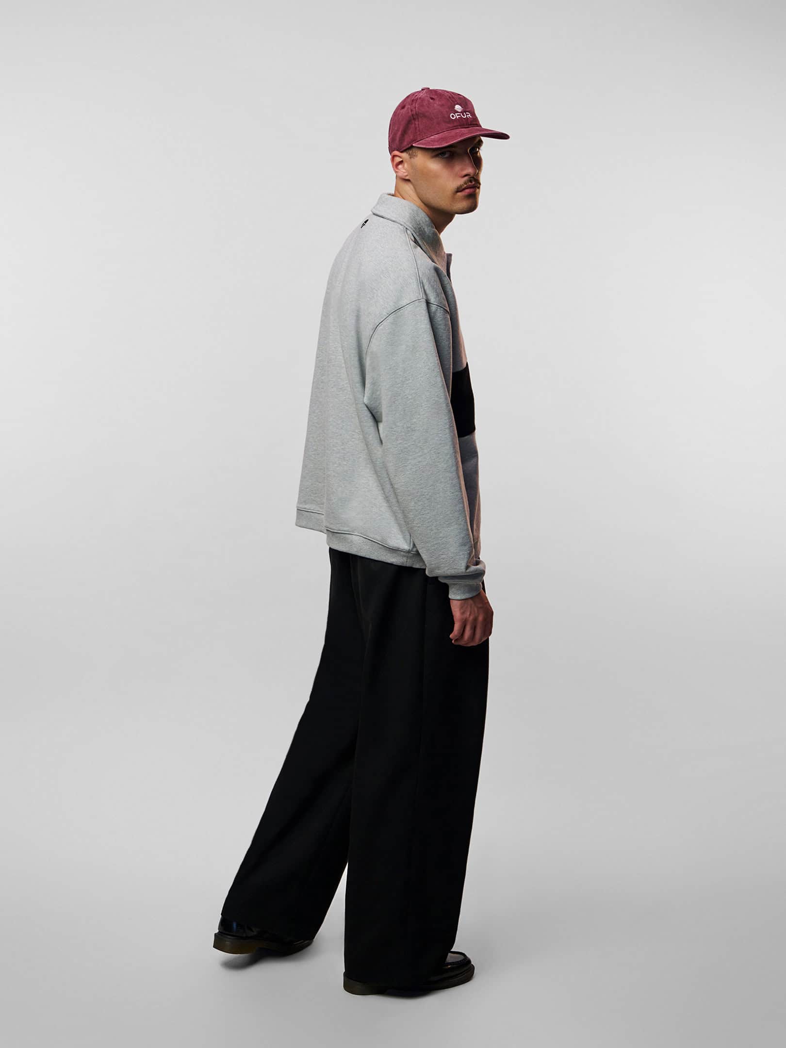 OFUR_FW26_WASHED_6PANEL_CAP_RED_FULL_BODY_SIDE_1
